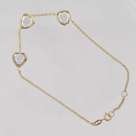 Armband med 3 hjärtan Guldfynd längd 17,5-19cm bredd 1,4mm, 18K Vikt: 2,8 g