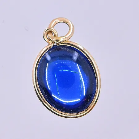 Hänge med blå sten längd 19 mm, 18K. Vikt: 1,3 g
