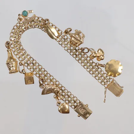 Armband X-länk med 9 Berlocker och grön sten 17cm bredd 8mm ÄSA (Ädelsmycken Aktiebolag) 18K Vikt: 17,6 g