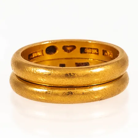 Två ringar graverade 12,3g. 