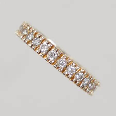 Ring helallians med diamanter 25 x ca 0,03ct, stl:17¾ bredd 4mm, ostämplad 14K Vikt: 3,6 g