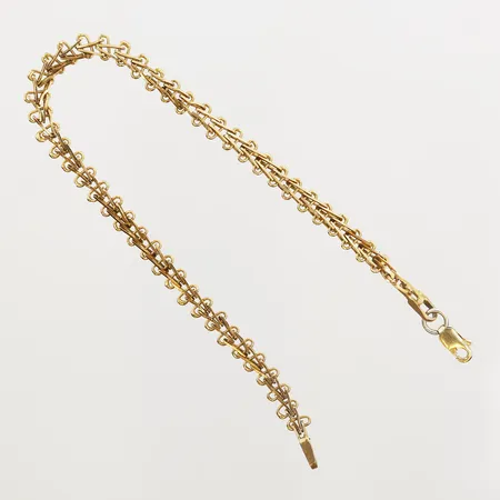 Armband längd 19cm, bredd 5mm, ögla i silver, ostämplad, 18K.  Vikt: 7 g