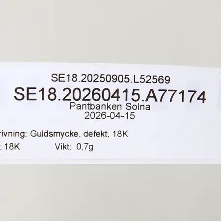 Guldsmycke, defekt, 18K Vikt: 0,7 g