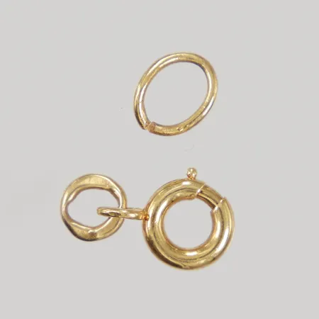 2 Låsdelar, 18K  Vikt: 1 g