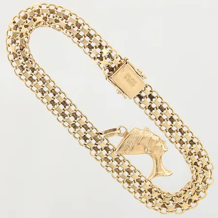 Armband X-länk med en integrerad berlock längd 19cm, bredd 7mm, 18K  Vikt: 11,8 g