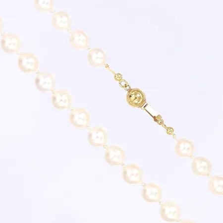 Pärlcollier med odlade rosatonade pärlor längd 50cm pärlornas Ø7mm låset av 18K eventuellt i behov av omtrådning bruttovikt 29,7g Vikt: 0 g