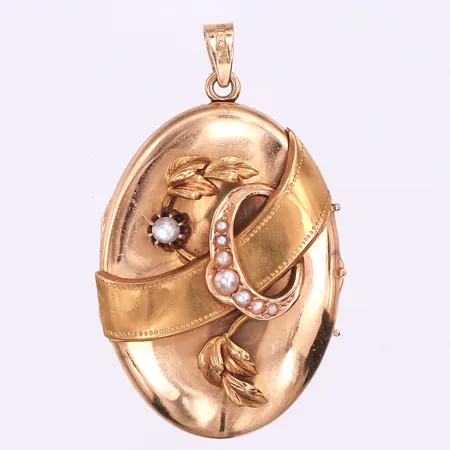 Fotomedaljong,Gustav Dahlgren & Co Malmö,gravyr/ojämnheter,höjd ca 40 mm,18k. Vikt: 8,6 g