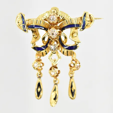 Brosch med 6 gammalslipade diamanter ca 0,30ctv och blå och svart emalj längd 35 mm, bredd 38 mm, mindre skador på emalj, ostämplad, 18K. Vikt: 5,5 g