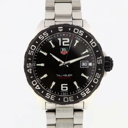 Herrur Tag Heuer Formula 1, stål quartz Ø40mm referens-nr: WAZ1110, WUM1780, datumfönster, länk innermått 18cm, bredd:18mm, viklås, repor,  mindre hack på ring, etui