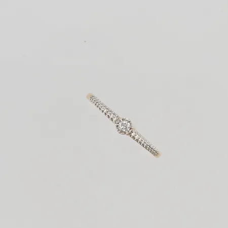 Ring med diamanter 0,15ctv stl:20 bredd 4mm 18K 2,0g.