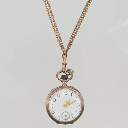 Fickur 34mm innerboett i metall, klockkedja i oädel metall. 