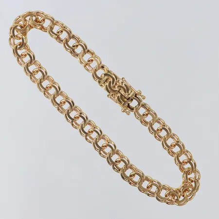 Armband Bismarck längd 19cm bredd 6,5mm 18K.  Vikt: 15,7 g