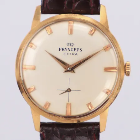 Herrur Pryngeps Extra 18K manuell 33mm, boettnr 0839, plexiglas, vinrött läderband, etui