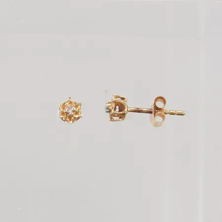 Örhängen diamanter 2x ca 0,01ct 4mm 18K 0,7g.