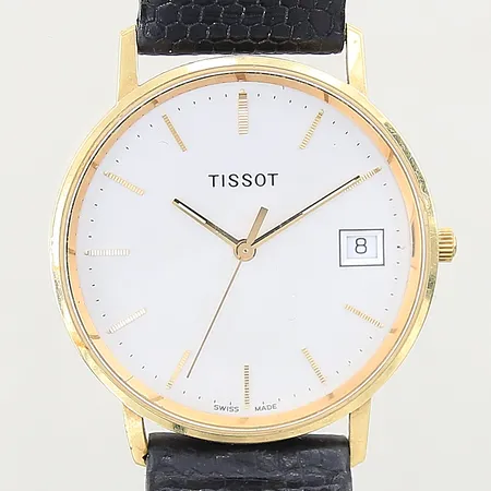 Herrur Tissot 18K quartz Ø34mm, safirglas, datum, läderband original med slitage, i behov av batteribyte, gravyr, boett med mindre repor, inga tillbehör 