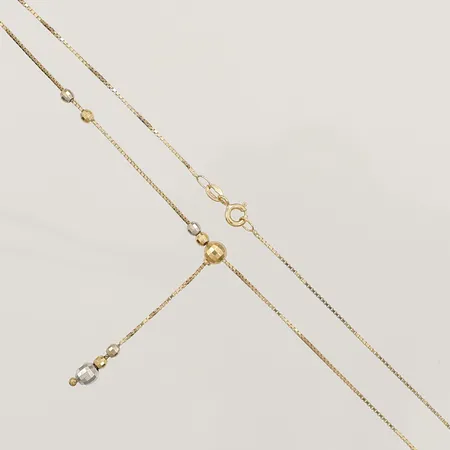 Collier tvåfärgat längd 43cm, bredd 0,8-5mm, 18K  Vikt: 3,8 g