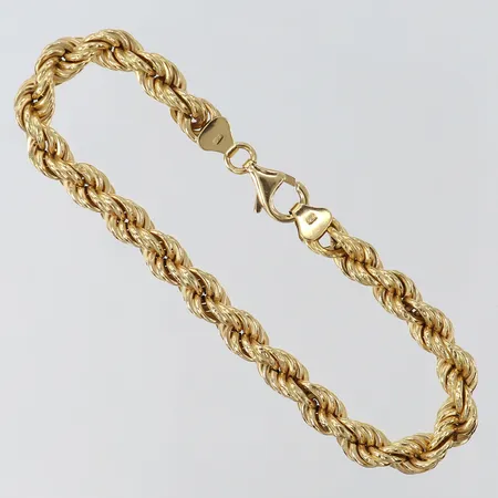 Armband Cordell GHA längd ca 19cm, bredd 6mm, ihåligt, småbucklor på länk 18K Vikt: 8,1 g