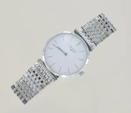 Damur Longines.46352 diam 33 mm, nytt batteri behövs.