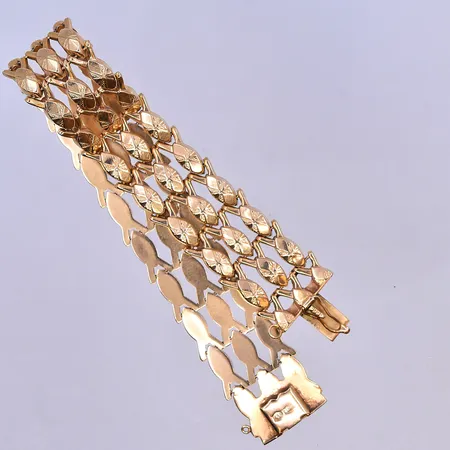 Armband längd 18,5 cm, bredd 18 mm 18K. Vikt: 20,8 g