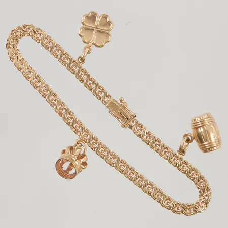 Armband Bismarck 18,5cm bredd 4mm, 3 berlocker, 18K 12,6g.