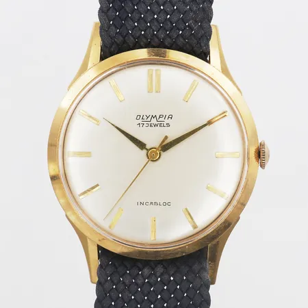 Herrur Olympia 18K Ø36mm, manuell, slitage, plexiglas med någon repa, ej originalband. 