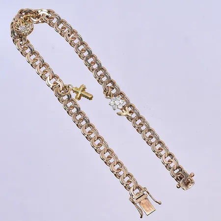 Armband Bismarck med 3 berlocker längd 19 cm, bredd 5 mm 18K. Vikt: 13,4 g