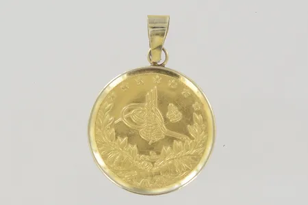 Hänge mynt längd 3,2 cm bredd 2,2 cm, 14/20K