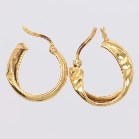 Två örhängen bucklor 18K  Vikt: 1,6 g