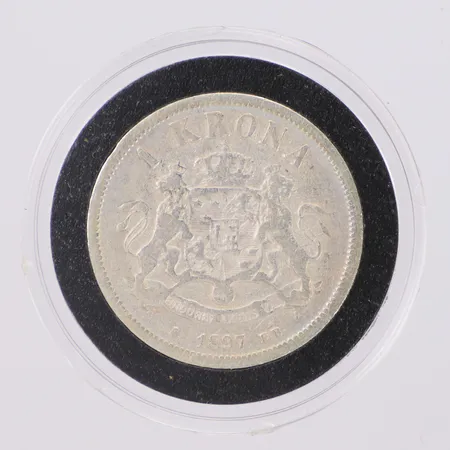 Mynt 1kr Oscar II Brödrafolkens väl 1897 Ø25mm, certifikat, etui, silver 800/1000 Vikt: 7,2 g