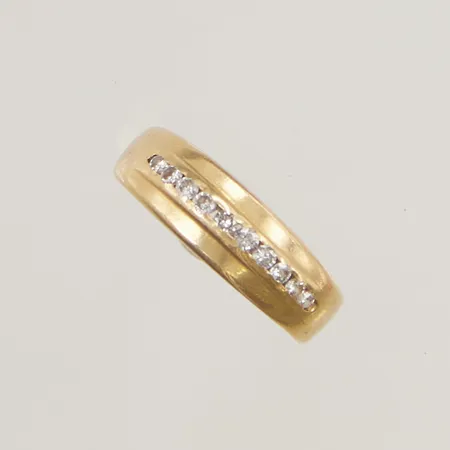 Ring med diamanter 10x 0,01ct stl:15¾ bredd 5mm 18K 2,7g.