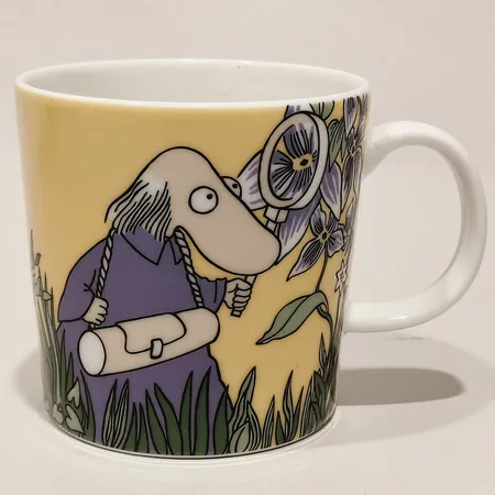 Muminmugg Hemulen gul, Moomin Arabia, höjd 8cm, Ø8cm.  Skickas med paket.