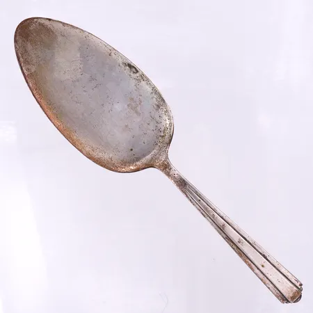 Bakelsespade Nordiska Kompaniet Stockholm 1932.längd ca 22.5 cm,silver 830/1000. Vikt: 76,8 g