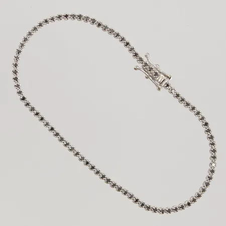 Armband svarta diamanter 84x ca 0,01ct 18cm bredd 2,2mm vitguld 18K 5,6g.