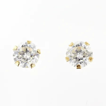 Ett par örhängen vita stenar Ø4mm 18K.  Vikt: 0,5 g