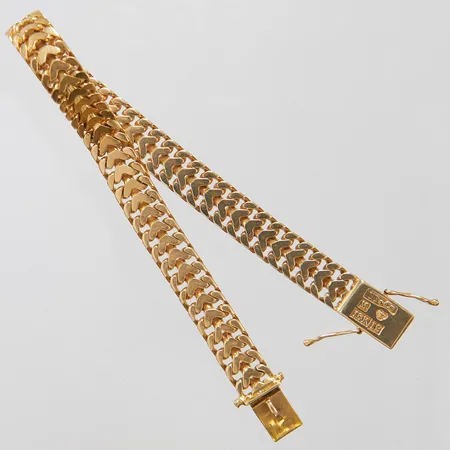Armband Fiskben längd: 19cm, bredd: 7,5mm, G. Dahlgren & Co, Malmö, 1959, en säkerhetsåtta glappar, 18K Vikt: 24,3 g