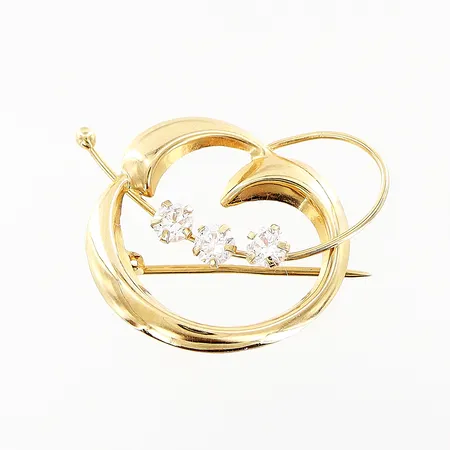 Brosch vita stenar 23x20mm vass nål 18K.  Vikt: 1,3 g