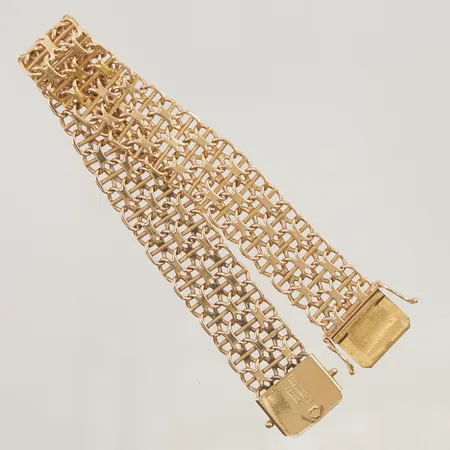 Armband x-länk med stav 19,7cm bredd 15mm 18K 32,3g.