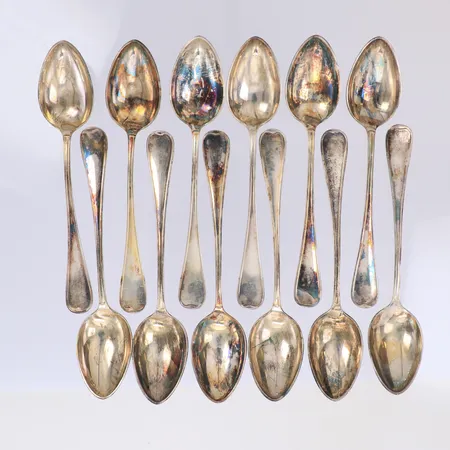 Tolv skedar 10,5cm Guldvaruhuset Aktiebolag år 1949 Stockholm silver 830/1000 Vikt: 150,6 g