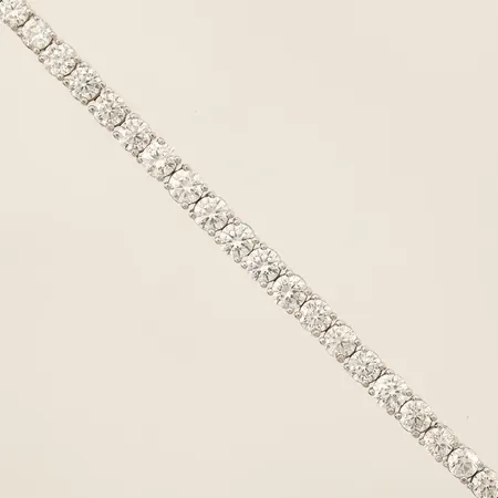 Armband med vita stenar vitguld, längd 18,5cm, bredd 3,9mm, ostämplat, 18K  Vikt: 14,7 g