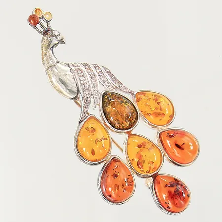 Brosch med bärnsten, 70x33mm, 2 stenar saknas, silver 925/1000 Vikt: 12,6 g