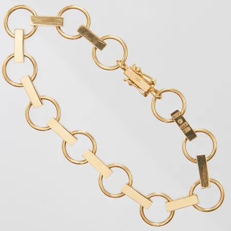 Armband längd: 18cm, bredd: 3-10,8mm, personlig gravyr, Bengt Liljedahl Formgivare & Silversmed, Stockholm, 1991, 18K, originaletui Vikt: 19,1 g