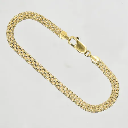 Armband X-länk längd 18 cm, bredd 5 mm, 18K. Vikt: 5,3 g