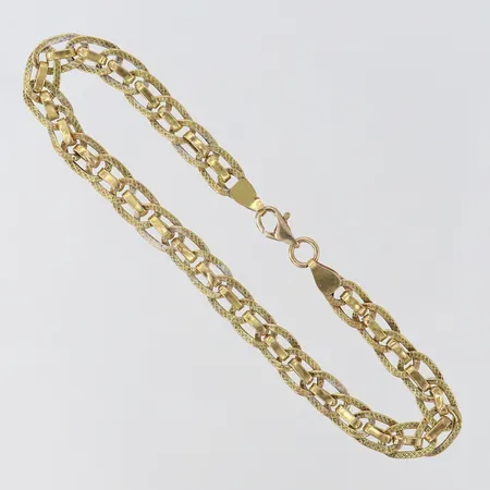 Armband Fantasilänk längd 18,5cm bredd 5,5mm skadade länkar bucklig 14K.  Vikt: 3,5 g