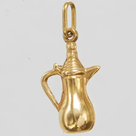 Hänge tekanna längd ca 27mm, bredd 13mm, repig, 18K Vikt: 1,2 g