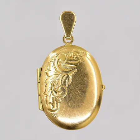 Hänge fotogömma Guldfynd längd 27mm bredd 15,8mm, bucklig baksida 18K Vikt: 2,4 g