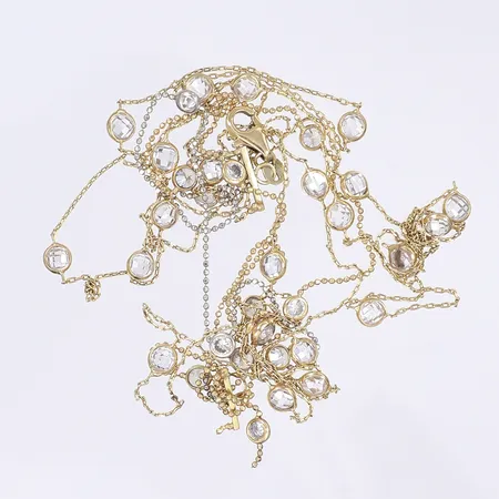 Diverse guld med vita stenar defekt 14K Vikt: 9,8 g