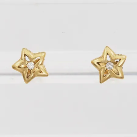 Ett par örhängen med diamanter 2x ca 0,02ct, mindre slitage, 18K guld.  Vikt: 1,6 g