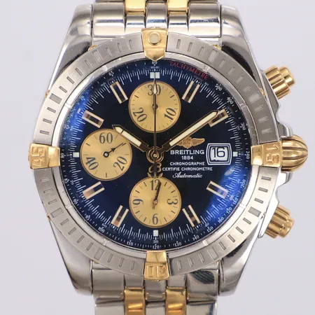 Herrur Breitling Chronomat Evolution stål/guld automatisk, 43mm, refnr B13356, snr 2169958, safirglas, kronograf, datum defekt går ej att ändra, pilotlänk i stål/guld, inga tillbehör 