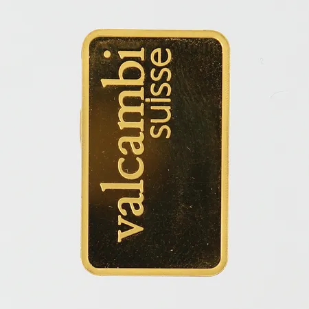Guldtacka Valcambi Suisse serienr AA603698 ca 25x15mm, bruten förpackning 24K Vikt: 10 g