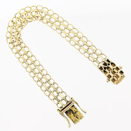 Armband X-länk längd 12,5cm bredd 8mm, kort modell, skevheter och slitage, 18K.  Vikt: 5,8 g